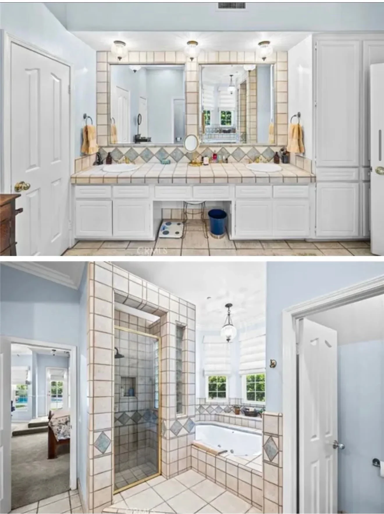 Dual vanity bathroom with white cabinets, tile backsplash, and glass-enclosed walk-in shower